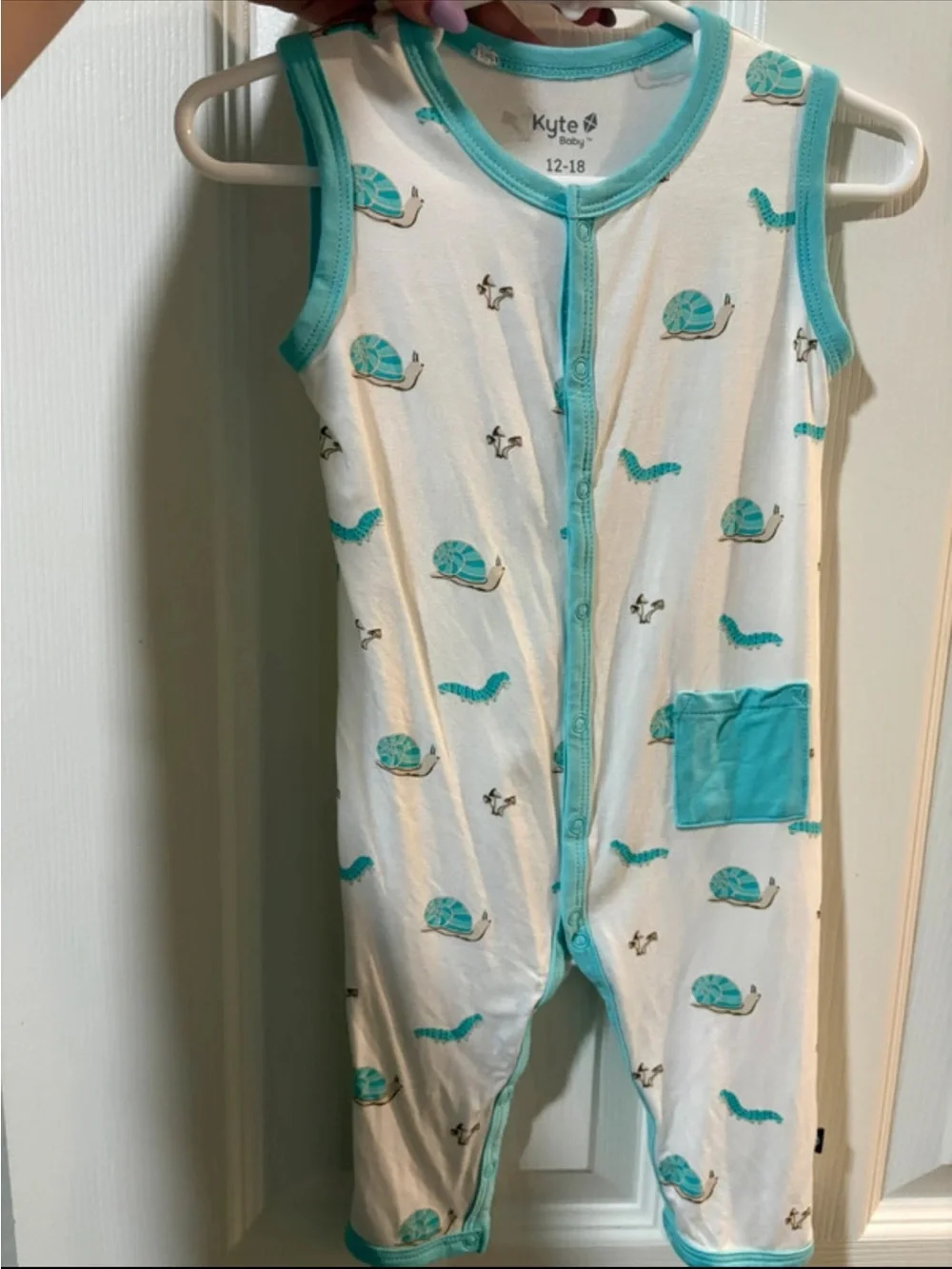 Kyte BABY White Sleeveless One-Piece with Turquoise Trim and Turtle Print